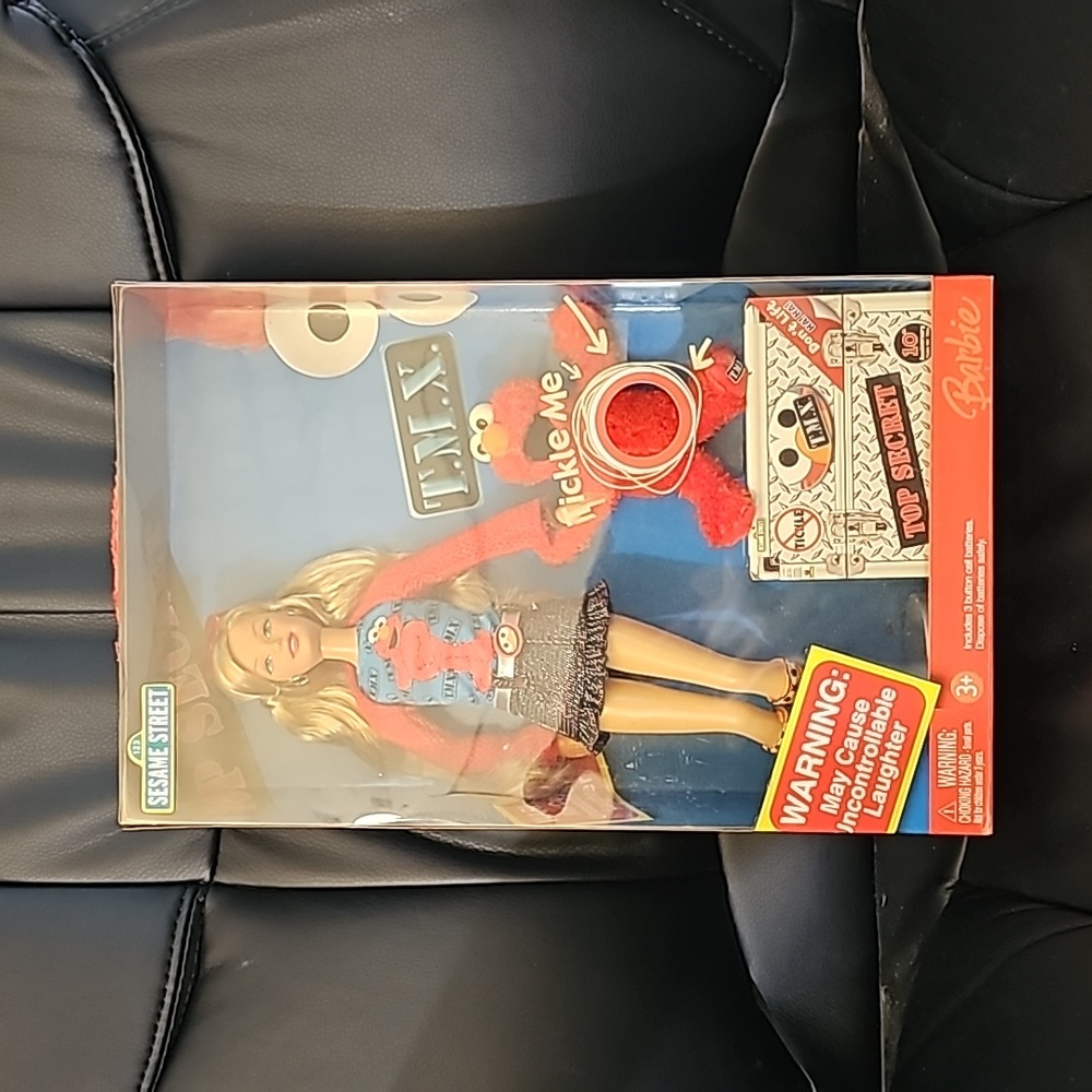 Tickle Me Elmo Barbie